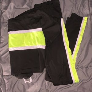 Matching lime green and black track suit